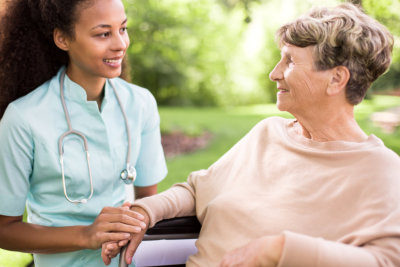 a nurse with a senior woman